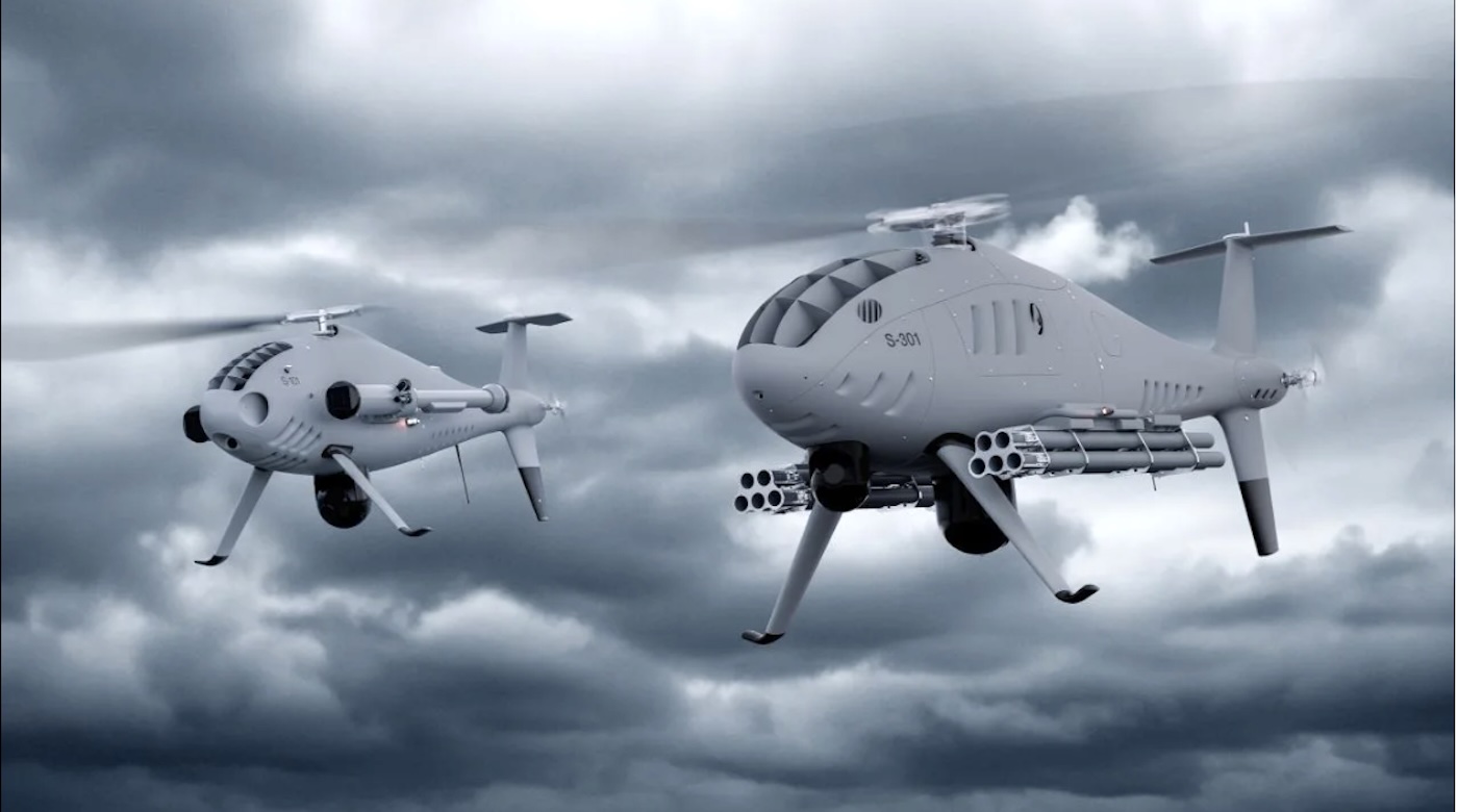 Schiebel zeiugte jüngst seine unbemannten Helikopter in neuen, bewaffneten Versionen: S-101 (l.) und S-301.